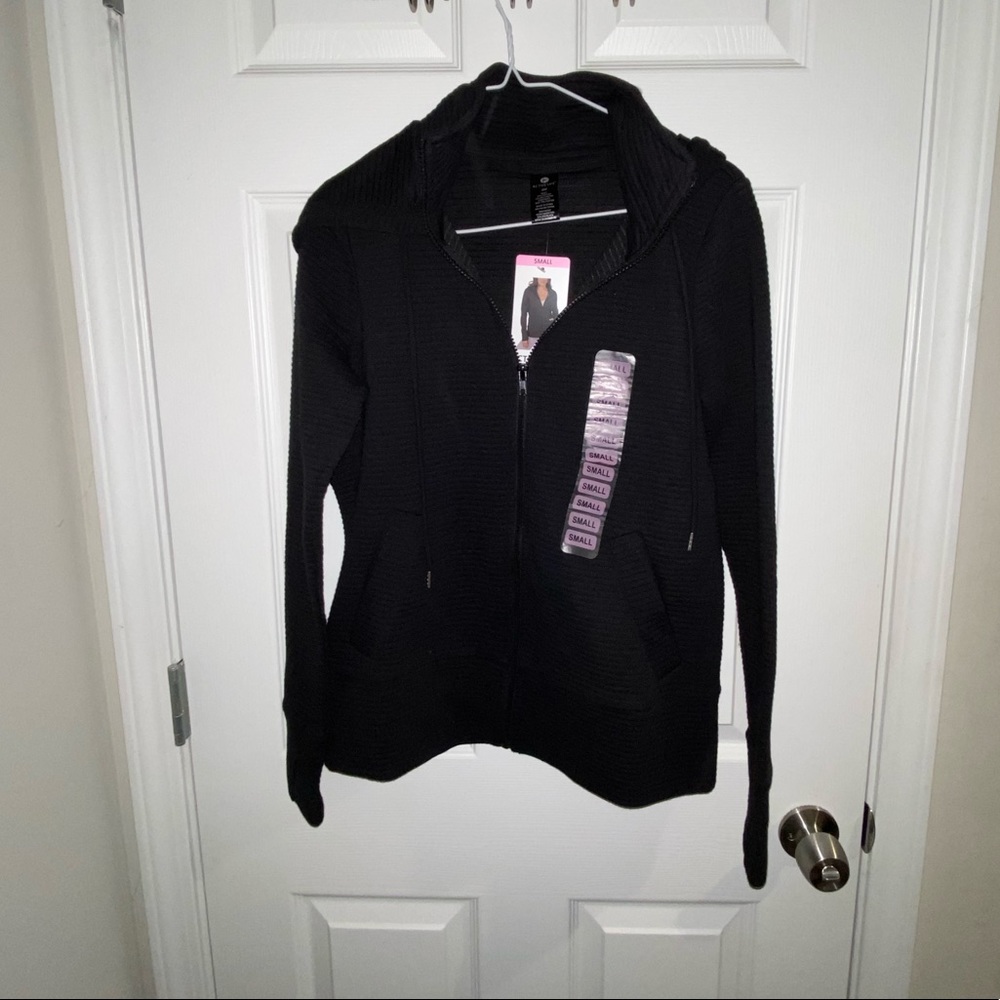 Athletic women’s jacket with hoodie